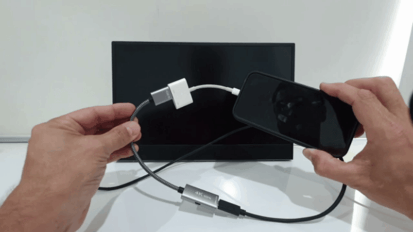 Why do some portable monitors lose signal when connecting to a phone?