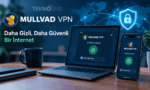 Çalışma masası üzerinde duran dizüstü bilgisayar ve akıllı telefonda açık olan Mullvad VPN arayüzünü, arka planda dünya haritası üzerinde parlayan bir güvenlik kalkanını ve "Daha Gizli, Daha Güvenli Bir İnternet" sloganını gösteren Teknobird görseli.
